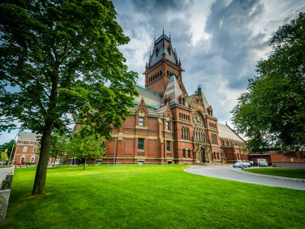 Newton's gateway to elite education: Harvard Memorial Hall, a symbol of academic excellence nearby.